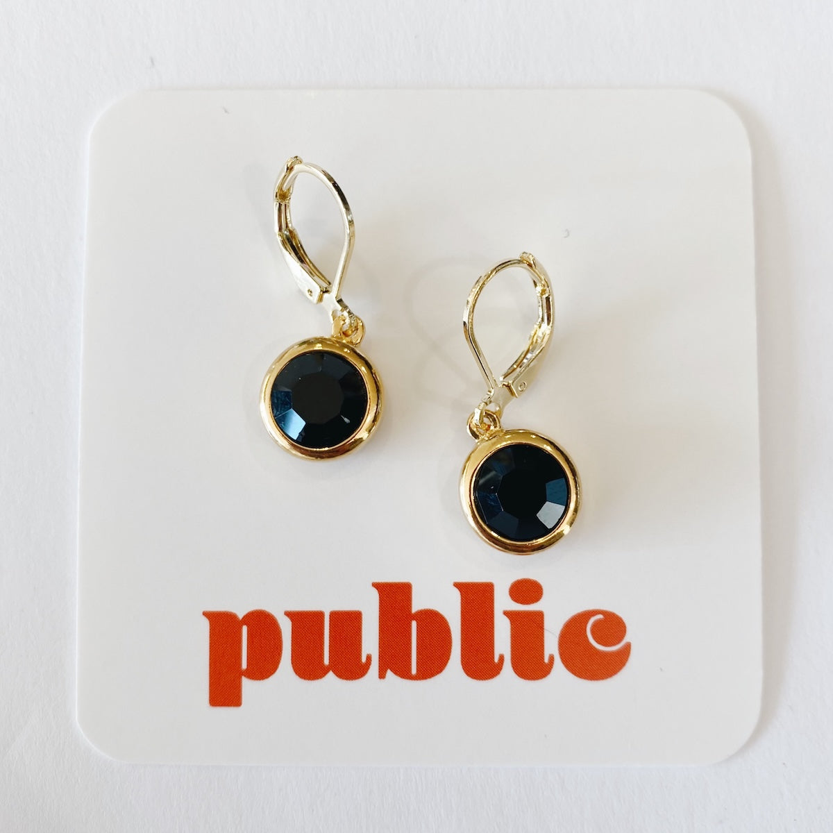 Boucles d'oreilles créoles torsadées en or 18 carats — Public Jewellery