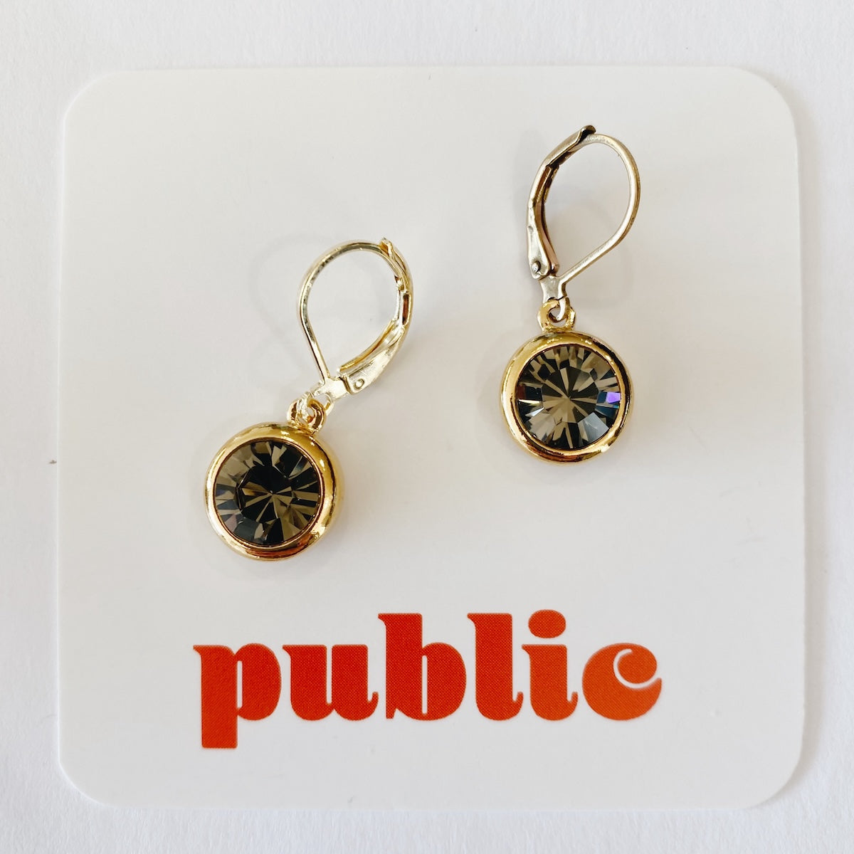 Boucles d'oreilles créoles torsadées en or 18 carats — Public Jewellery