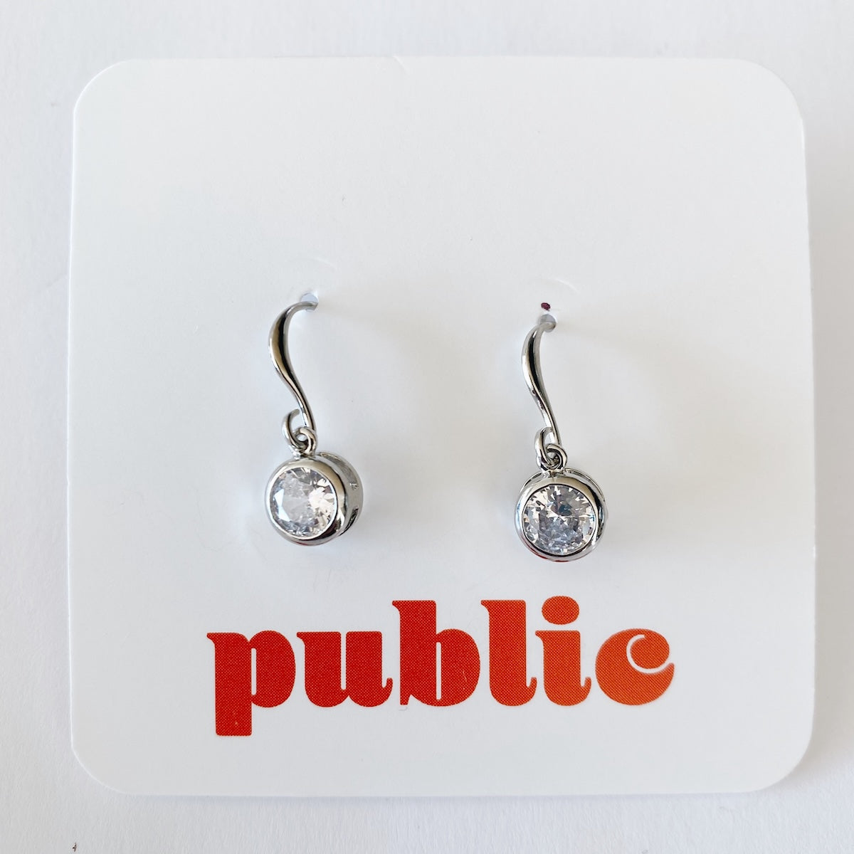 Boucles d'oreilles créoles torsadées en or 18 carats — Public Jewellery
